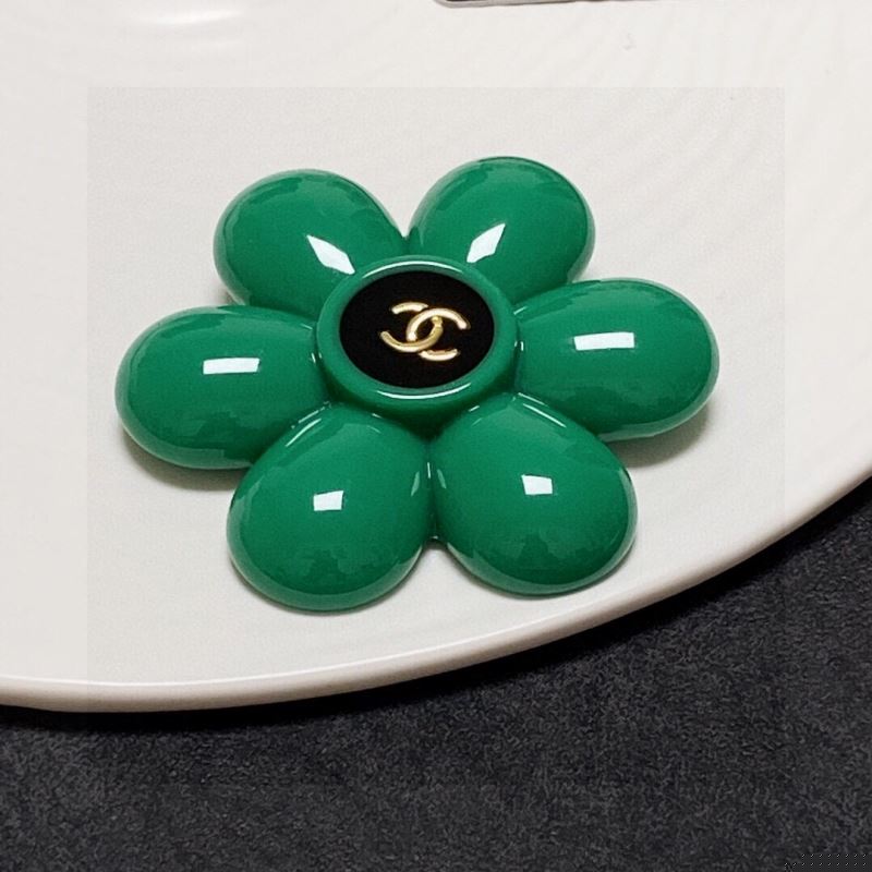 Ch*el brooches